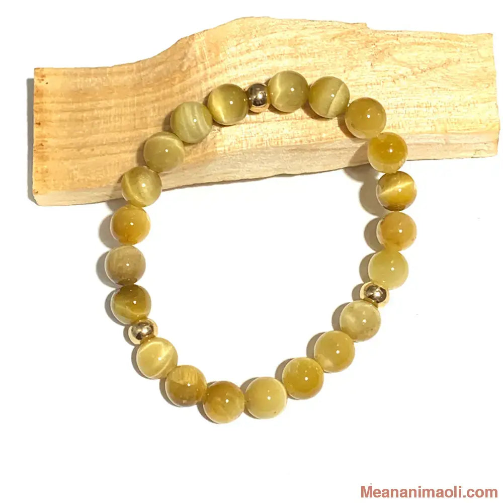 Bracelet Œil de Tigre en pierre naturelle pour lithothérapie avec séparateurs en acier inoxydable doré.