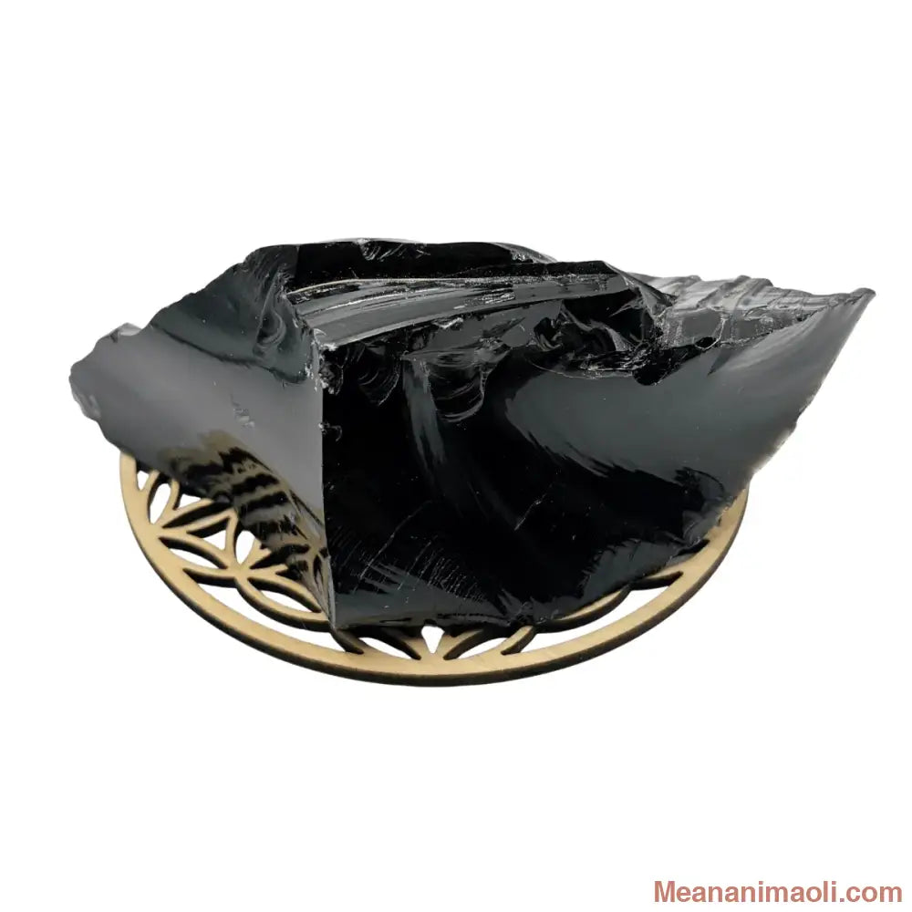 Obsidienne Noire brute naturelle 250g - Pierre de protection - posée sur une fleur de vie en bois