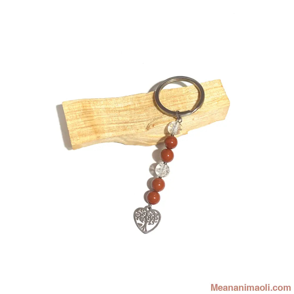 Porte-clés en perles de Jaspe Rouge et de Cristal de Roche craquelé, avec une breloque Arbre de Vie en forme de cœur argentée. Accessoire énergétique MEANANIMAOLI.