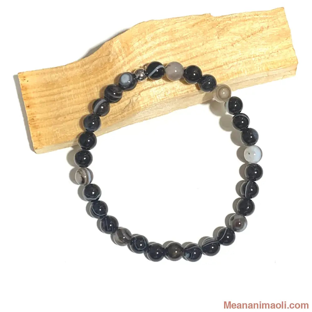 Bracelet Agate Œil 6mm, avec une perle en acier inoxydable argenté.