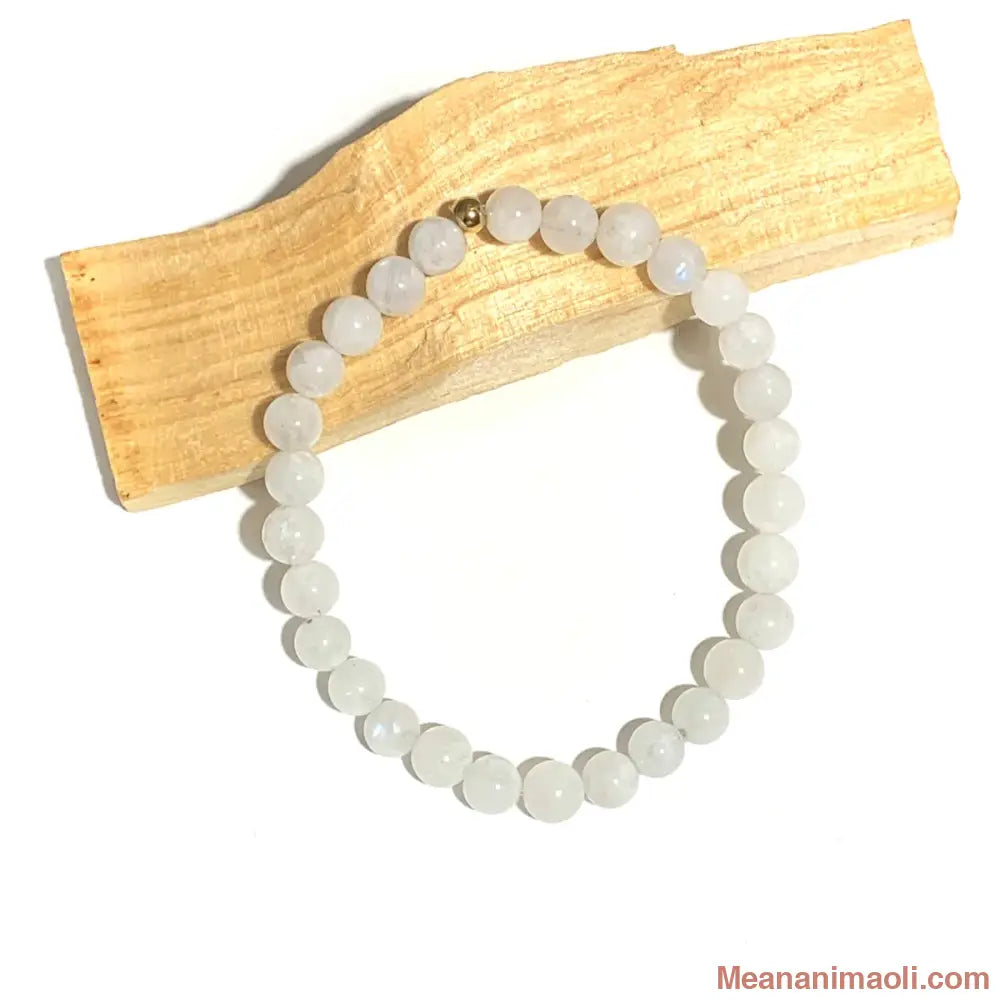 Bracelet Labradorite Blanche 6mm avec perle en acier inoxydable doré.