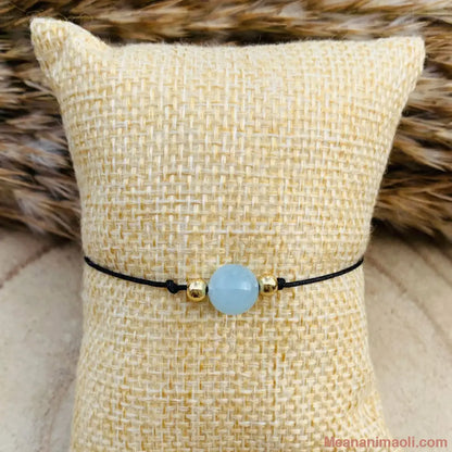 Bracelet macramé avec perle d’aigue-marine – bijou ajustable de calme et d’expression