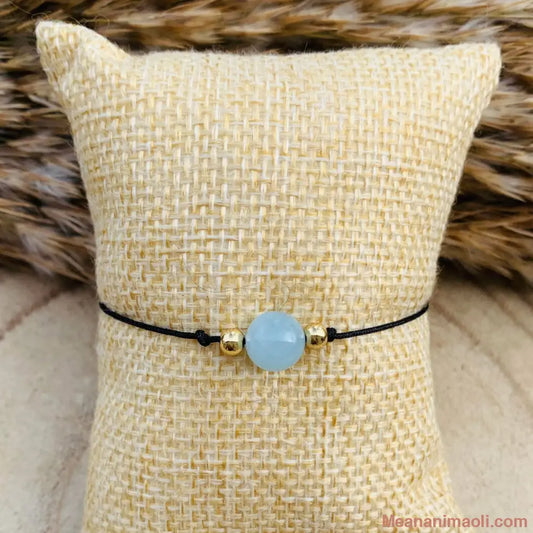 Bracelet macramé avec perle d’aigue-marine – bijou ajustable de calme et d’expression