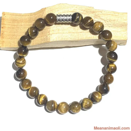 Bracelet homme en oeil de tigre 8 mm en pierres naturelles pour lithothérapie avec perle acier inox argenté.