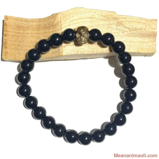 Bracelet Onyx Noir 8 mm en pierres naturelles pour lithothérapie, Perle Tête de Mort Acier Inoxydable Doré.