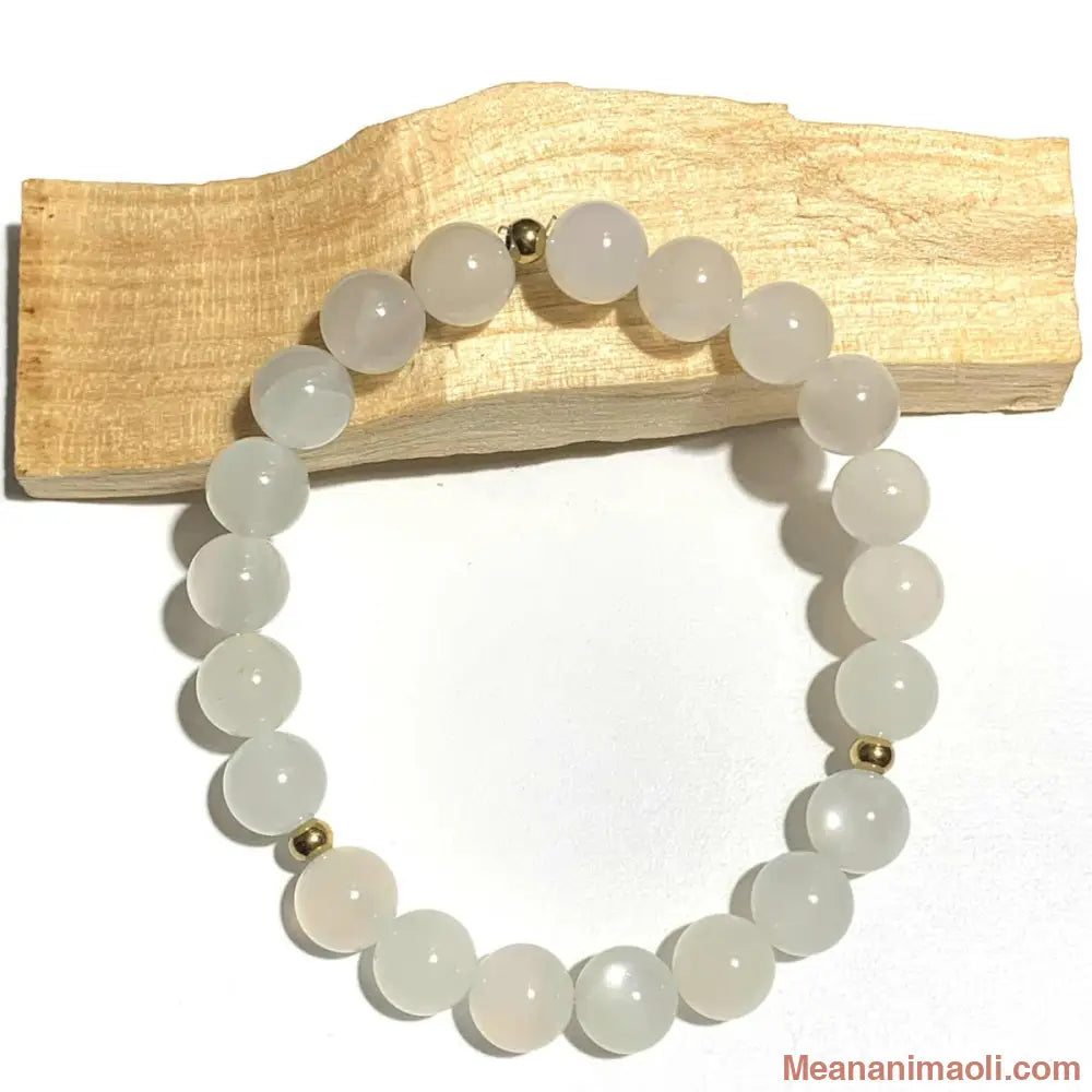 Bracelet Pierre de Lune 8mm en pierres naturelles pour la lithothérapie, avec séparateurs en acier doré.
