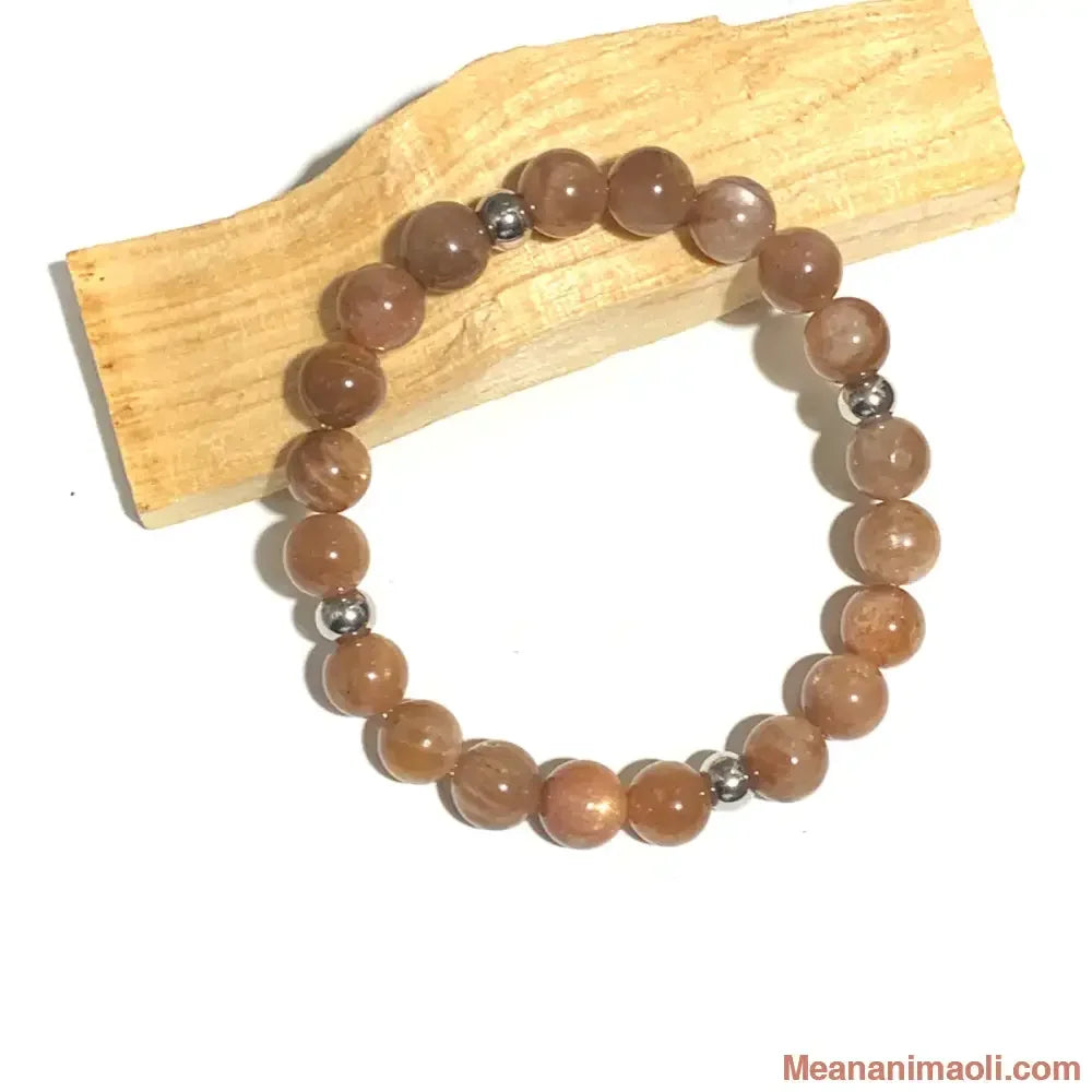 Bracelet en pierre du soleil 8mm en pierres naturelles pour lithothérapie avec perles acier inoxydable argenté.
