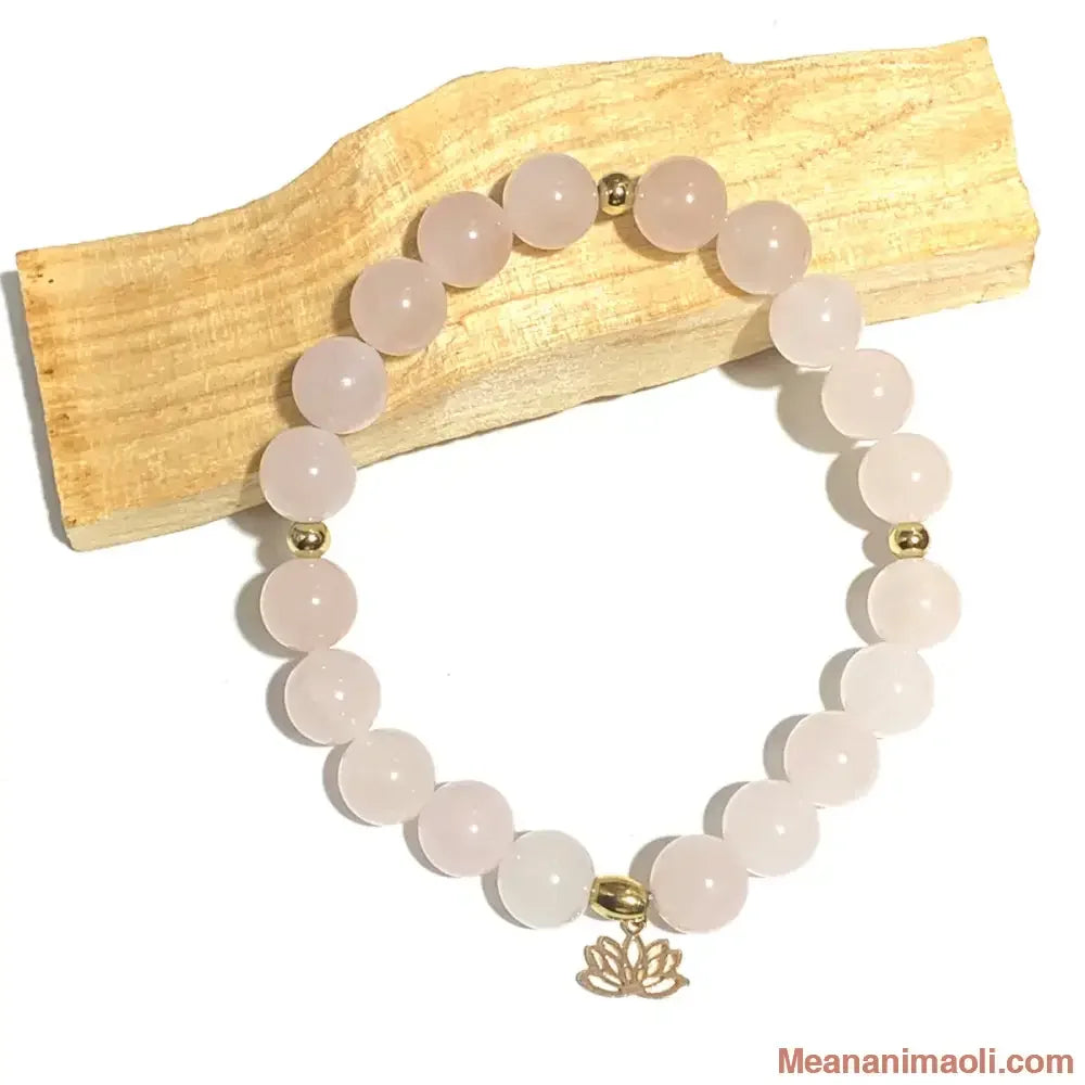 Bracelet quartz rose 8 mm en pierres naturelles pour lithothérapie avec perles et lotus en acier inox doré.