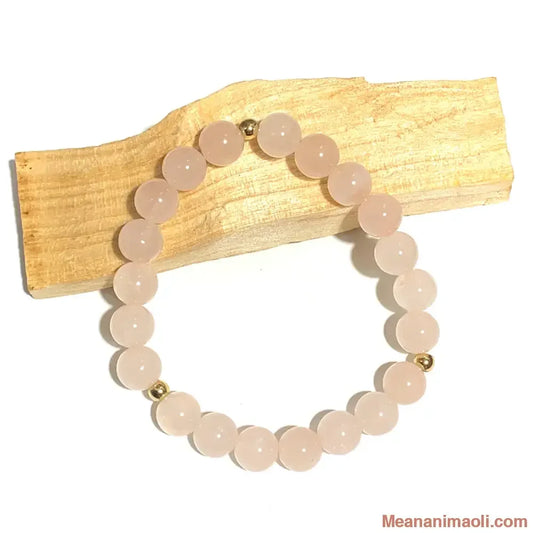 Bracelet quartz rose 8 mm en pierres naturelles pour lithothérapie avec perles acier inox doré.