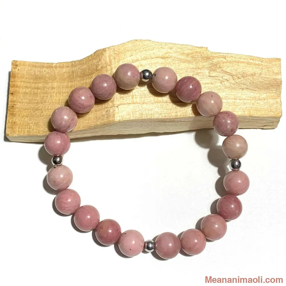 Bracelet Rhodonite 8mm en pierres naturelles pour la lithothérapie, avec séparateurs en acier argenté.