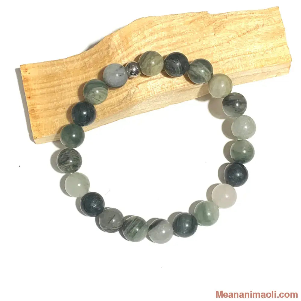 Bracelet smaragdite 8 mm en pierres naturelles pour lithothérapie avec une perle acier inox argenté.