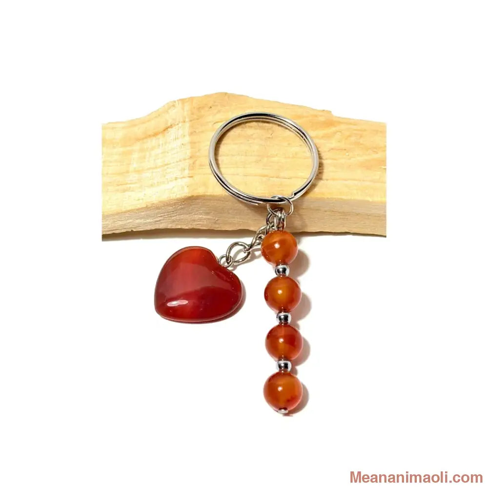 Porte-clé argenté avec quatre perles 8 mm et un cœur en Cornaline naturelle rouge orangé sur bois de Palo Santo - MEANANIMAOLI