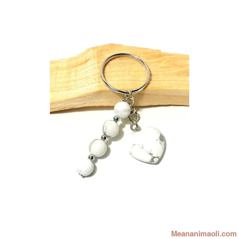 Porte-clé argenté avec quatre perles 8 mm et un cœur en Howlite naturelle blanche marbrée sur bois de Palo Santo - MEANANIMAOLI