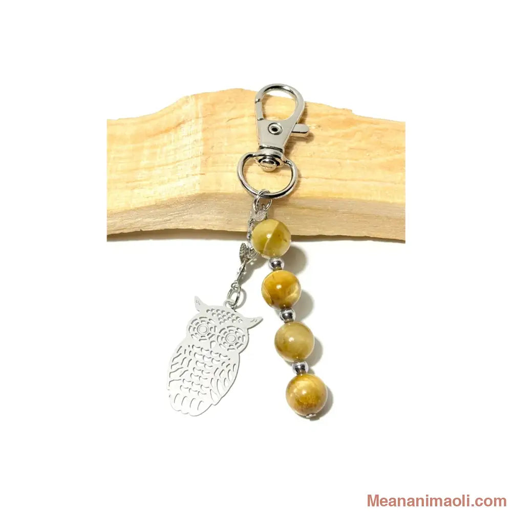 Porte-clé avec quatre perles 8 mm en Œil de Tigre Doré et une grande breloque hibou ciselée sur bois de Palo Santo - MEANANIMAOLI