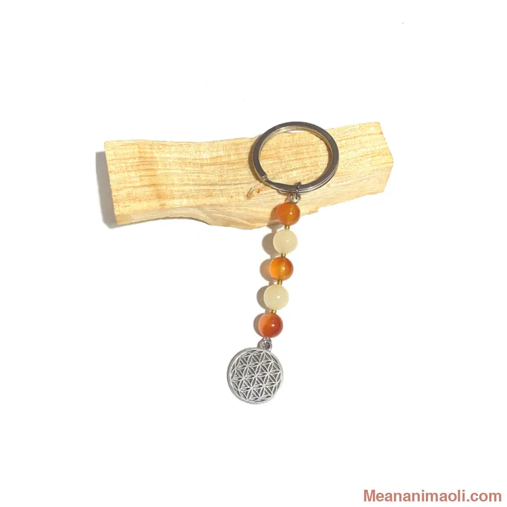 Porte-clés avec perles de Cornaline et de Calcite Jaune, orné d'une breloque Fleur de Vie en acier inoxydable. Accessoire énergétique MEANANIMAOLI.