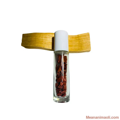 Flacon Roll-On rechargeable en verre transparent avec bille diffuseur en Jaspe Rouge naturel. Utilisé pour l'application d'huiles essentielles. Produit MEANANIMAOLI.