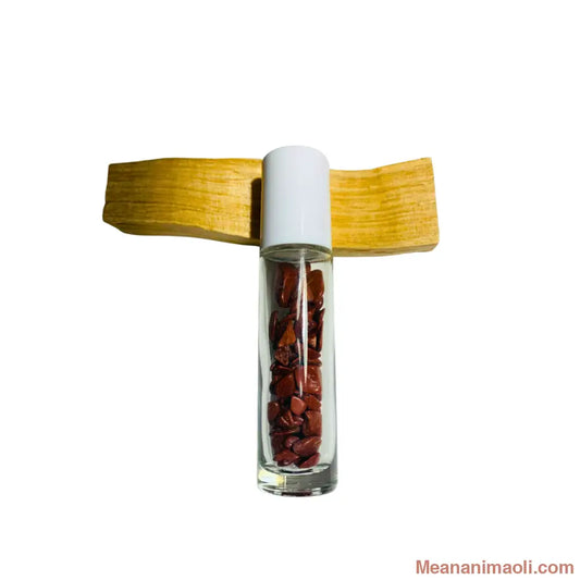 Flacon Roll-On rechargeable en verre transparent avec bille diffuseur en Jaspe Rouge naturel. Utilisé pour l'application d'huiles essentielles. Produit MEANANIMAOLI.