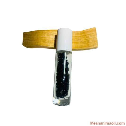 Flacon Roll-On rechargeable en verre transparent avec bille diffuseur en Obsidienne Dorée. Utilisé pour l'application d'huiles essentielles. Produit MEANANIMAOLI.